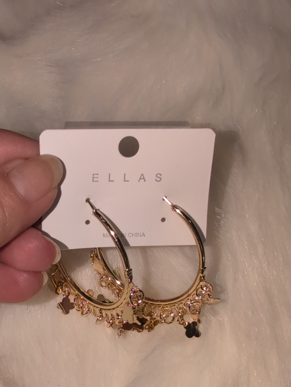 Ella Gold Tone Hoop Earrings with gold Tone Flower Shaped Dangle Charms